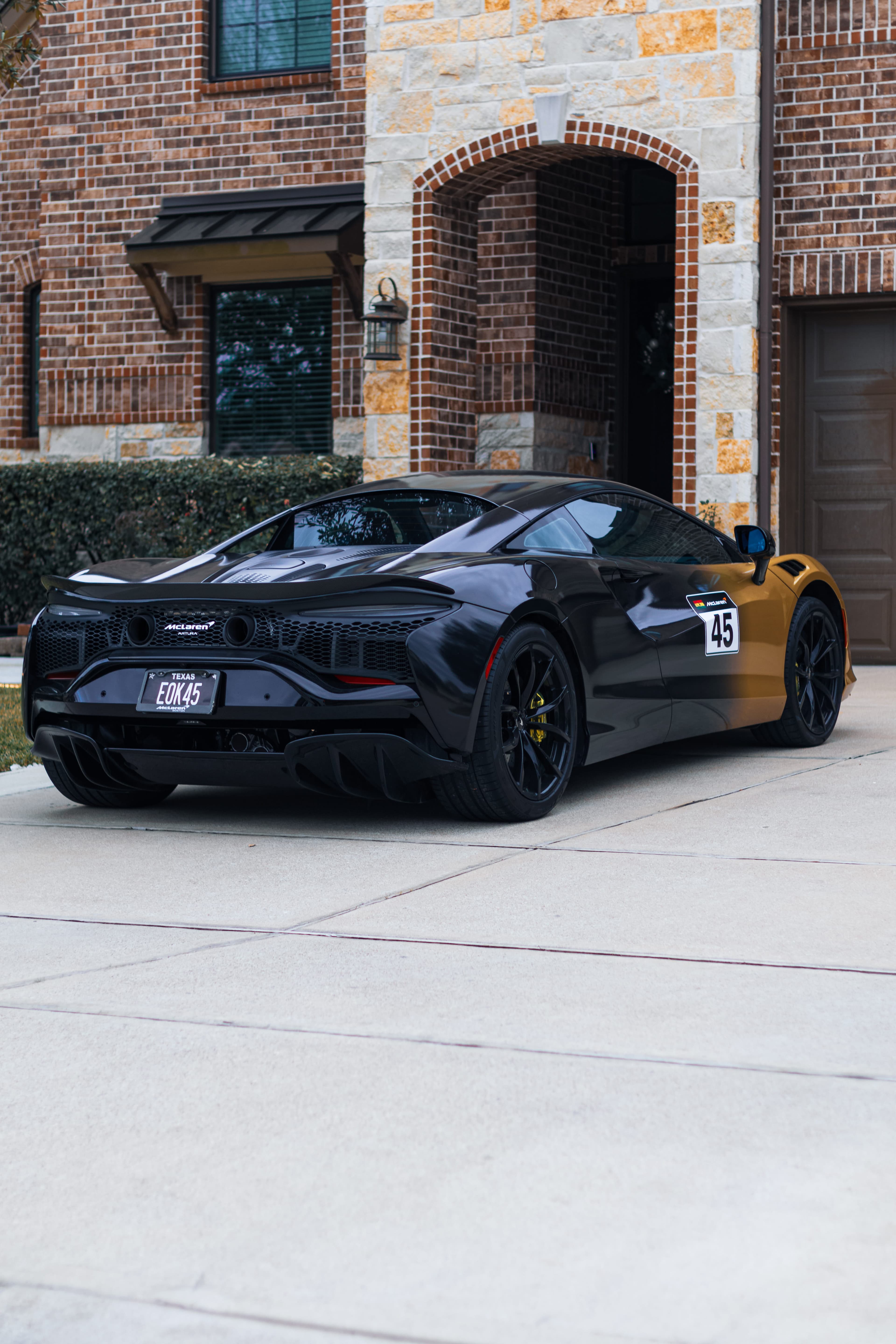 McLaren supercar receiving professional mobile detailing service in Richmond TX