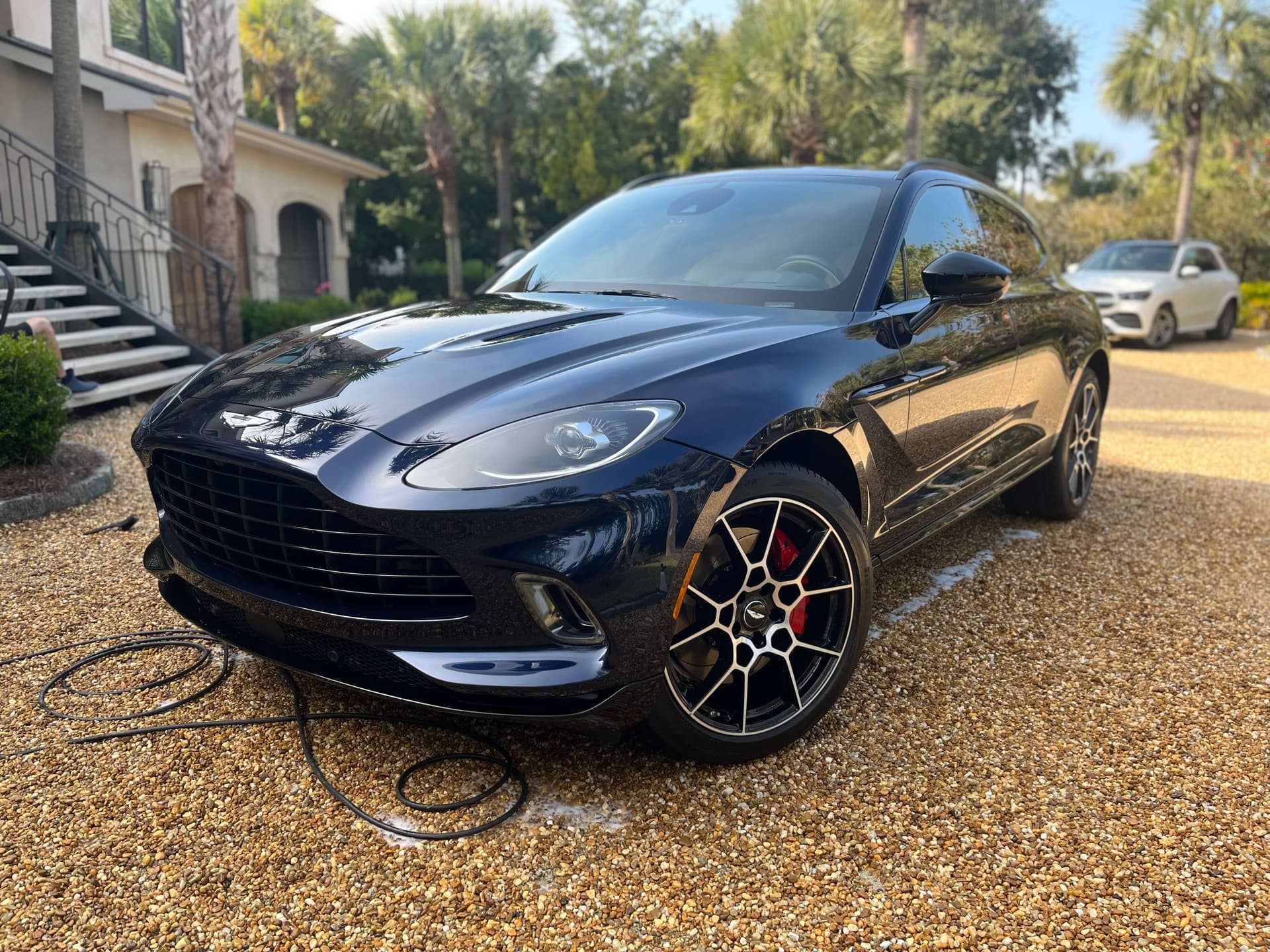 Professional exterior hand wash on a luxury vehicle in Sugar Land TX