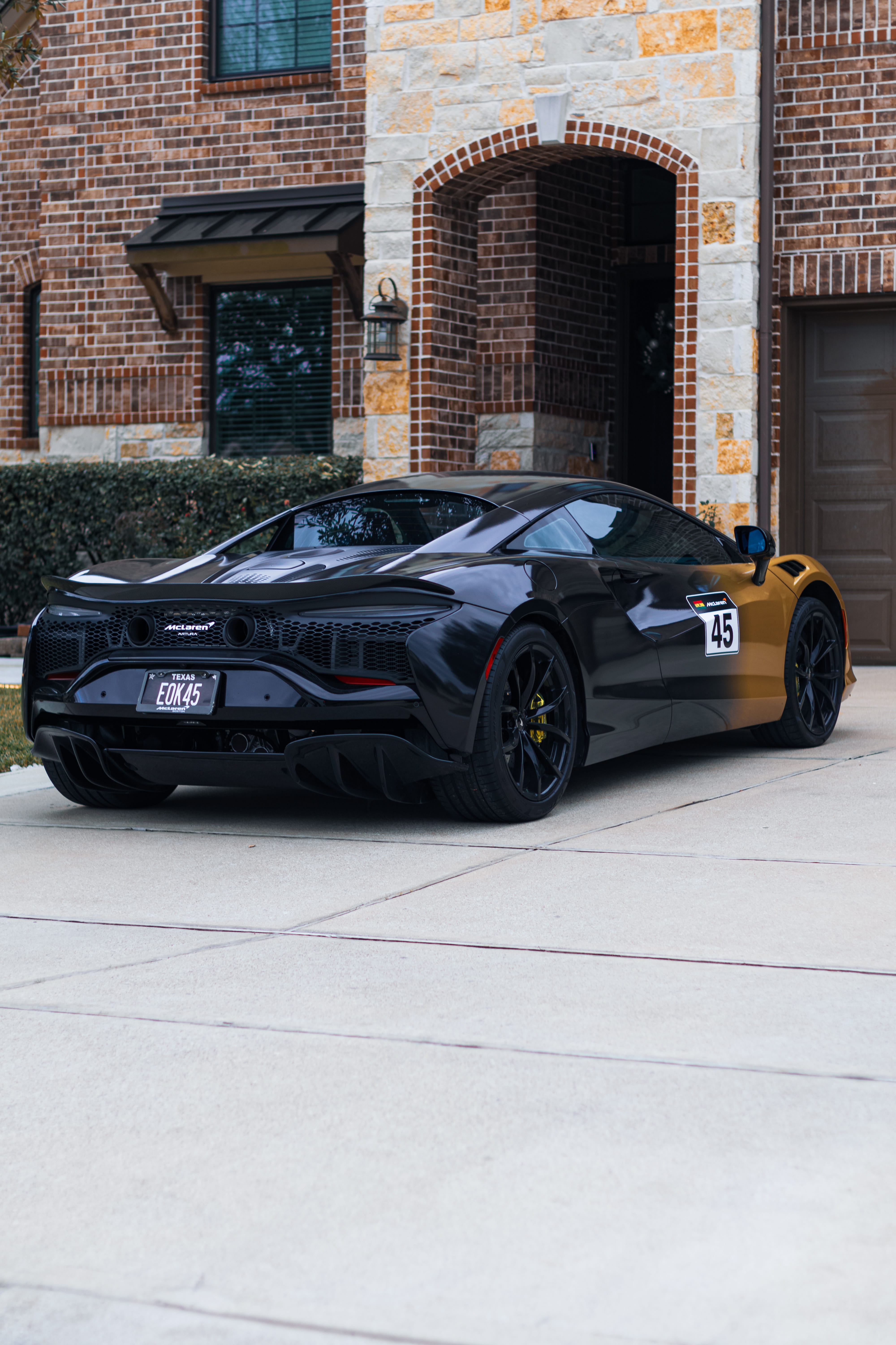 McLaren supercar receiving professional mobile detailing service in Richmond TX